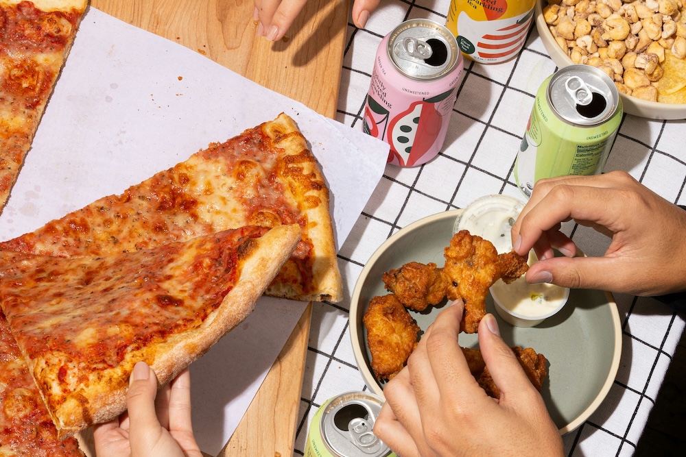 Friends eating meal together